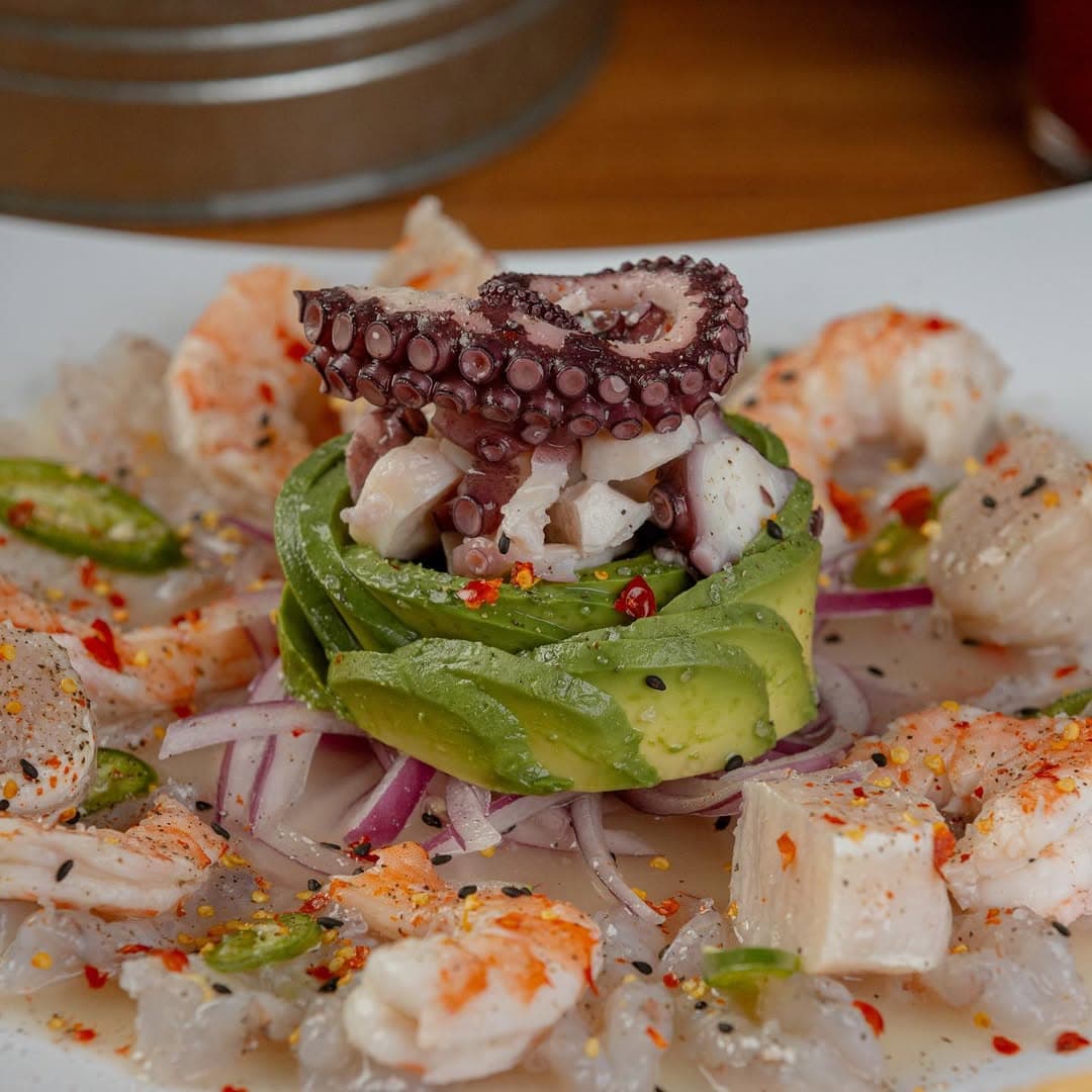 Fresh Mexican seafood platter with shrimp ceviche and coastal ambiance at Mariscos a Todo Mar